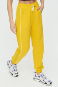 Оптом Спортивные брюки женские желтого цвета 1306J в Екатеринбурге, фото 13