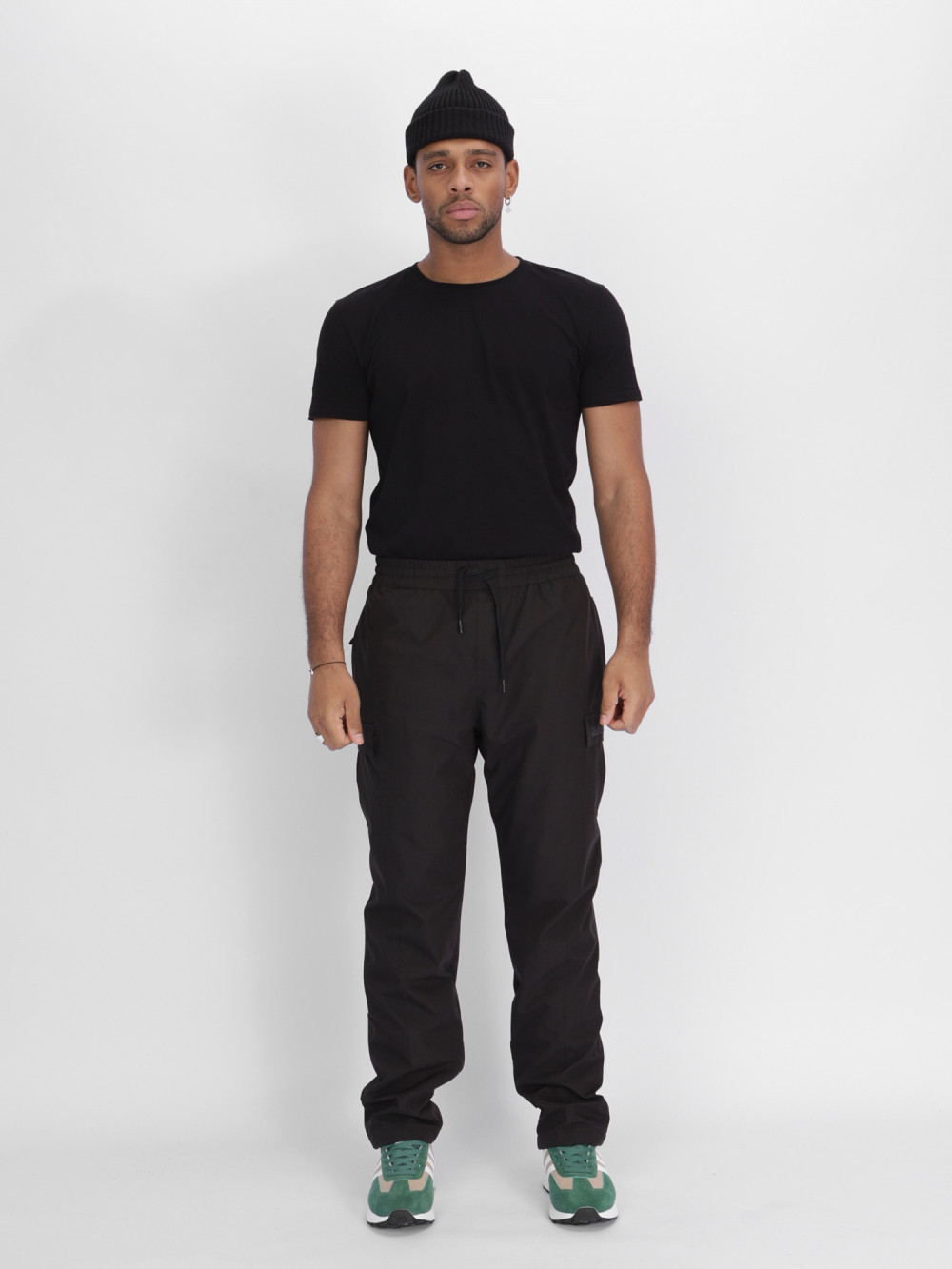 Купить оптом Утепленные спортивные брюки мужские темно-серого цвета 21132TC в Казани