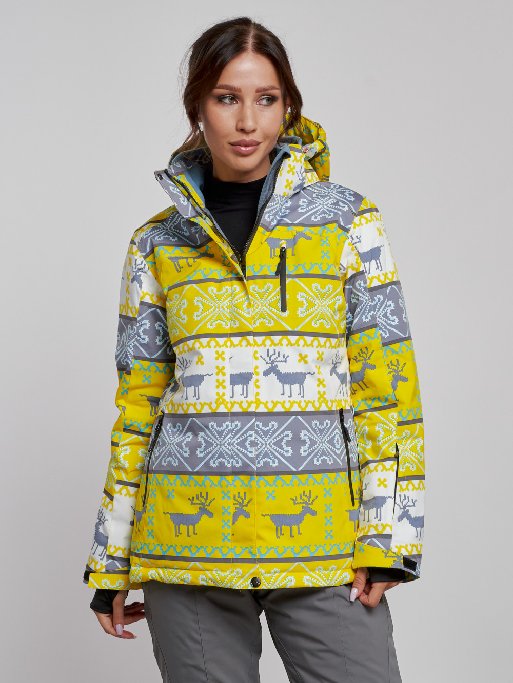 Купить оптом Горнолыжная куртка женская зимняя желтого цвета 22302J в Екатеринбурге