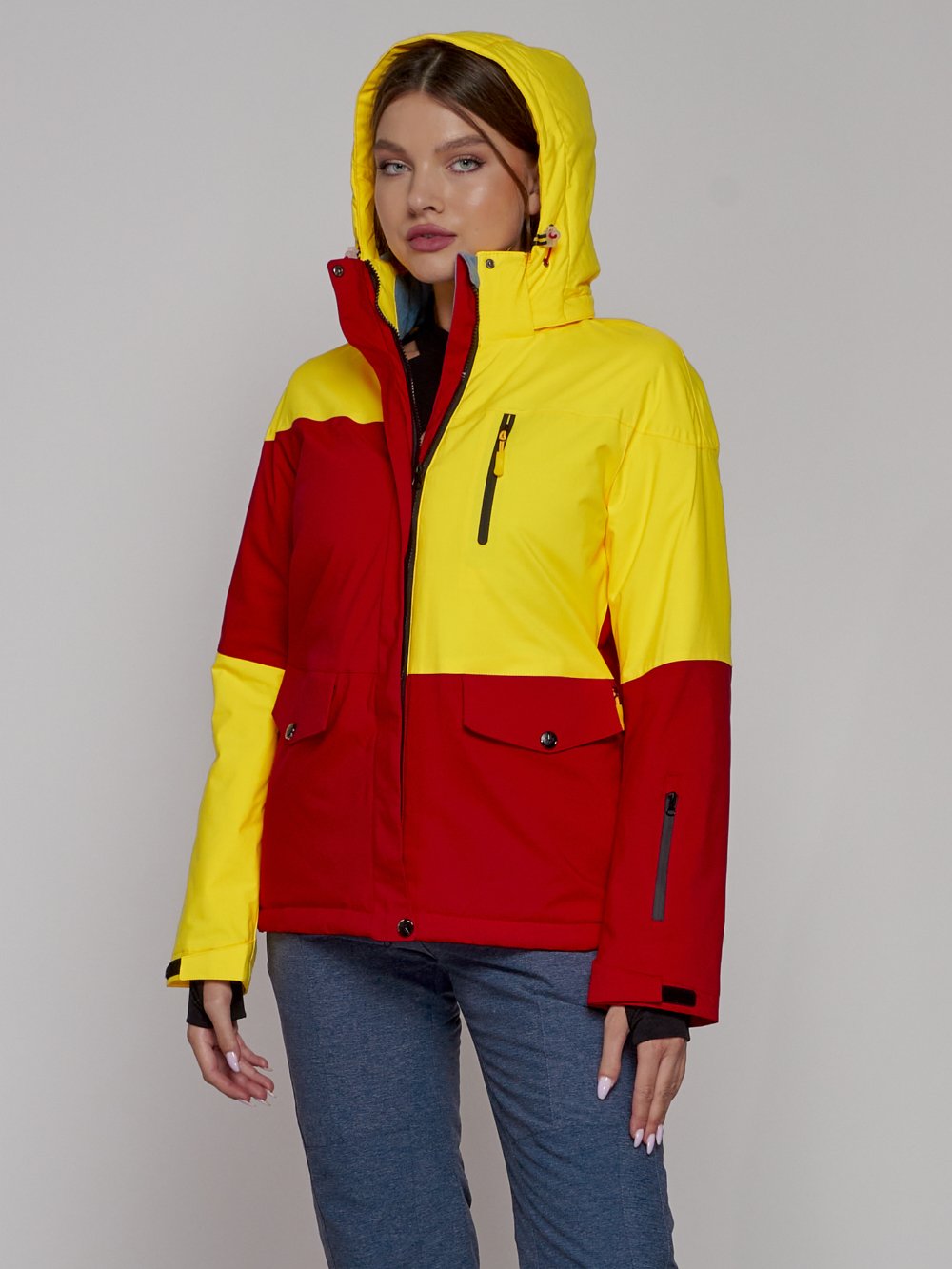 Купить оптом Горнолыжная куртка женская зимняя желтого цвета 2302-1J в Казани