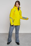 Оптом Горнолыжный костюм женский зимний желтого цвета 02316J в  Красноярске, фото 7