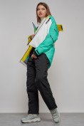Оптом Горнолыжный костюм женский зимний желтого цвета 02322J в  Красноярске, фото 24
