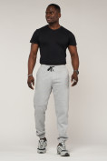 Оптом Брюки джоггеры спортивные с карманами мужские светло-серого цвета 062SS, фото 6
