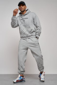 Оптом Спортивный костюм мужской трикотажный демисезонный серого цвета 12010Sr в Сочи