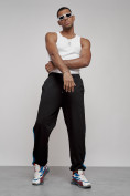 Оптом Широкие спортивные штаны трикотажные мужские черного цвета 12903Ch в Перми, фото 10