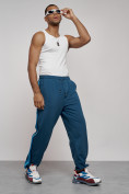 Оптом Широкие спортивные штаны трикотажные мужские синего цвета 12903S, фото 4