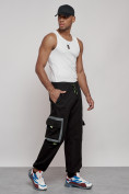 Оптом Широкие спортивные брюки трикотажные мужские черного цвета 12908Ch в Омске, фото 3