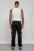 Оптом Широкие спортивные брюки трикотажные мужские черного цвета 12908Ch, фото 4