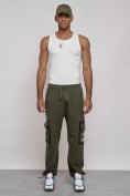 Оптом Широкие спортивные брюки трикотажные мужские цвета хаки 12908Kh в Новосибирске