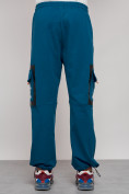 Оптом Широкие спортивные брюки трикотажные мужские синего цвета 12908S в Перми, фото 11