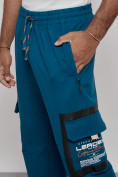 Оптом Широкие спортивные брюки трикотажные мужские синего цвета 12908S в Перми, фото 12
