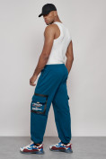 Оптом Широкие спортивные брюки трикотажные мужские синего цвета 12908S в Калининграде, фото 22