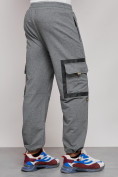 Оптом Широкие спортивные брюки трикотажные мужские серого цвета 12908Sr в Перми, фото 13