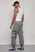 Оптом Широкие спортивные брюки трикотажные мужские серого цвета 12908Sr в Уфе, фото 24