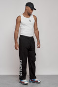 Оптом Широкие спортивные брюки трикотажные мужские черного цвета 12910Ch в Уфе, фото 6