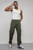 Оптом Широкие спортивные брюки трикотажные мужские цвета хаки 12910Kh в Перми