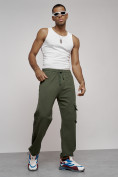 Оптом Широкие спортивные брюки трикотажные мужские цвета хаки 12910Kh в Перми, фото 2