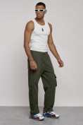 Оптом Широкие спортивные брюки трикотажные мужские цвета хаки 12910Kh в Казани, фото 6