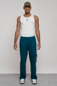 Оптом Широкие спортивные брюки трикотажные мужские синего цвета 12910S в Саратове