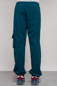 Оптом Широкие спортивные брюки трикотажные мужские синего цвета 12910S в Омске, фото 12