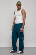 Оптом Широкие спортивные брюки трикотажные мужские синего цвета 12910S, фото 2
