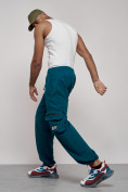 Оптом Широкие спортивные брюки трикотажные мужские синего цвета 12910S в Ярославле, фото 20