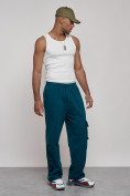 Оптом Широкие спортивные брюки трикотажные мужские синего цвета 12910S, фото 3