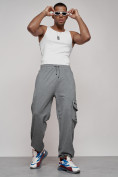 Оптом Широкие спортивные брюки трикотажные мужские серого цвета 12910Sr
