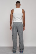 Оптом Широкие спортивные брюки трикотажные мужские серого цвета 12910Sr в Перми, фото 10