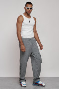 Оптом Широкие спортивные брюки трикотажные мужские серого цвета 12910Sr в Перми, фото 9