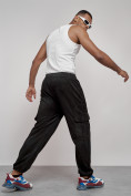 Оптом Спортивные мужские штаны из бархатного трикотажа черного цвета 12929Ch в Казани, фото 7