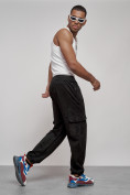 Оптом Спортивные мужские штаны из бархатного трикотажа черного цвета 12929Ch в Саратове, фото 8