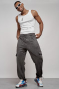 Оптом Спортивные мужские штаны из бархатного трикотажа серого цвета 12929Sr, фото 24