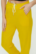 Оптом Штаны джоггеры женские желтого цвета 1302J в Перми, фото 12