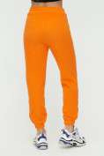 Оптом Штаны джоггеры женские оранжевого цвета 1302O в Перми, фото 10