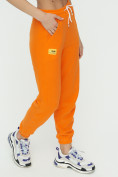 Оптом Штаны джоггеры женские оранжевого цвета 1302O в Перми, фото 11
