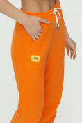 Оптом Штаны джоггеры женские оранжевого цвета 1302O в Перми, фото 14