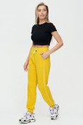 Оптом Спортивные брюки женские желтого цвета 1306J, фото 4