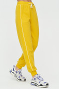 Оптом Спортивные брюки женские желтого цвета 1306J, фото 9