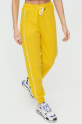 Оптом Спортивные брюки женские желтого цвета 1306J, фото 14