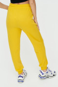 Оптом Спортивные брюки женские желтого цвета 1306J, фото 15