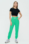 Оптом Спортивные брюки женские зеленого цвета 1306Z в  Красноярске, фото 2