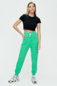 Оптом Спортивные брюки женские зеленого цвета 1306Z, фото 4