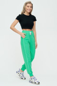 Оптом Спортивные брюки женские зеленого цвета 1306Z, фото 6