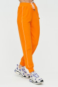 Оптом Спортивные брюки женские оранжевого цвета 1306O в Перми, фото 7