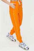 Оптом Спортивные брюки женские оранжевого цвета 1306O в  Красноярске, фото 11