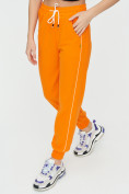 Оптом Спортивные брюки женские оранжевого цвета 1306O в  Красноярске, фото 12