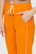 Оптом Спортивные брюки женские оранжевого цвета 1306O в Перми, фото 14
