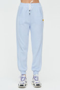 Оптом Спортивные брюки женские голубого цвета 1306Gl в Перми
