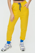 Оптом Спортивные брюки женские желтого цвета 1307J в Казани, фото 6